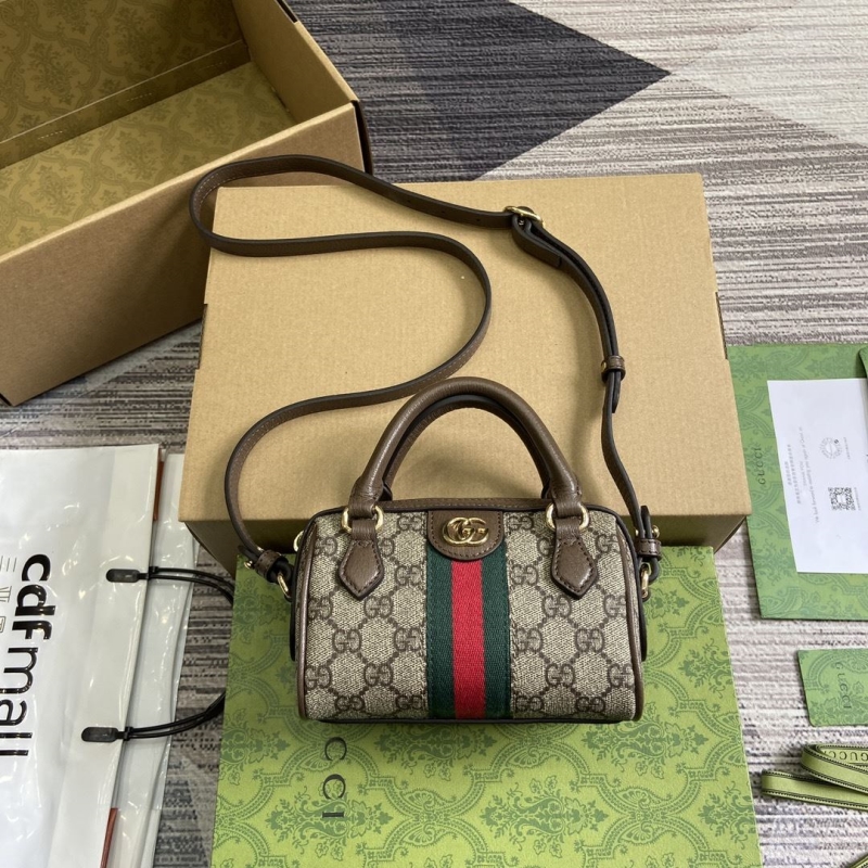G*u*i top handle bags